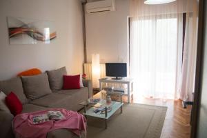 TV a/nebo společenská místnost v ubytování Leona