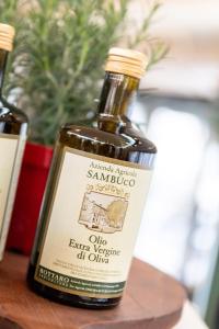 a bottle of sambuca oil sitting on a table at Agriturismo Sambuco in Pastrengo
