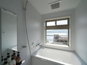 Bagno di Ryokan with natural hot springs and okonomiyaki Miyajima-an Hiroshima