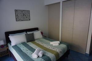 Destination Cefalu - your best view tesisinde bir odada yatak veya yataklar