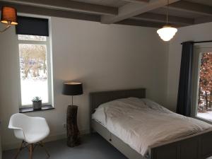 Postel nebo postele na pokoji v ubytování B&B Boerderij De Vaete - Duurzaam genieten in de zak van Zuid-Beveland