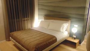 Letto o letti in una camera di MaisonSilvi'