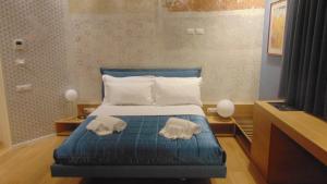 Letto o letti in una camera di MaisonSilvi'
