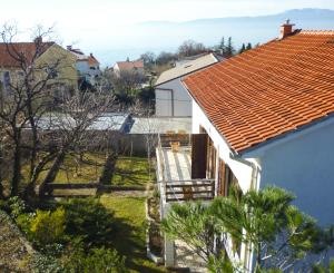 a view of a house with an orange roof at Leona in Kraljevica