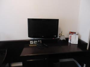 TV i/ili multimedijalni sistem u objektu Hotel Marthahaus