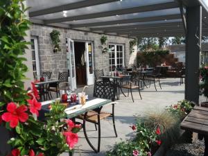 Ein Restaurant oder anderes Speiselokal in der Unterkunft Bed en Breakfast le freyr 