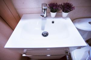 Koupelna v ubytování Cozy Suite Kallithea