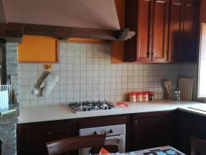 Kuchyň nebo kuchyňský kout v ubytování Le Case dell'Arco – Monte San Vito