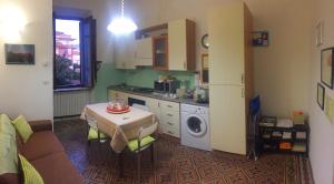 A kitchen or kitchenette at Eco Bed & Breakfast I Due Oleandri