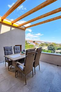 Balkón nebo terasa v ubytování Apartments Villa Laura
