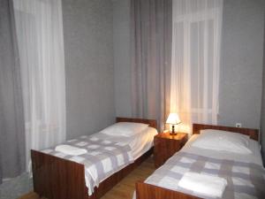Postel nebo postele na pokoji v ubytování Guest House T&N