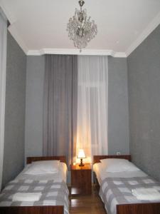 Postel nebo postele na pokoji v ubytování Guest House T&N