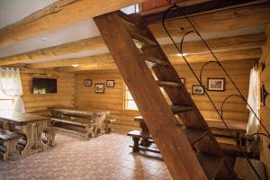 TV a/nebo společenská místnost v ubytování Tindioru Holiday House + 37 fotografií