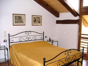 Giường trong phòng chung tại Agri BERTORELLA