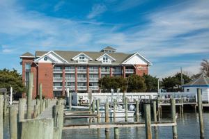 a large building with a marina in front of it at Anchorage Inn & Marina in Ocracoke