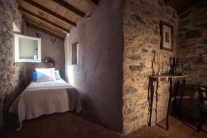 Postel nebo postele na pokoji v ubytování Casale Amati Country House