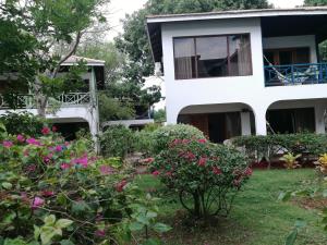 a view of the house from the garden at Ltu Garden in Negril