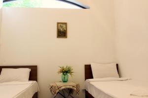 Letto o letti in una camera di Hostel Near The Square