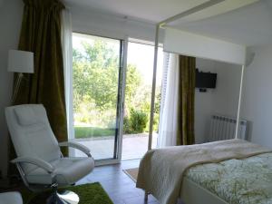 Postel nebo postele na pokoji v ubytování Hotel Garazar