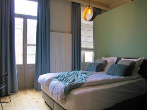 Postel nebo postele na pokoji v ubytování B&B La Corderie