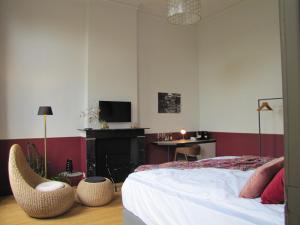 TV a/nebo společenská místnost v ubytování B&B La Corderie