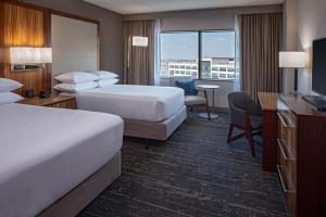 Postel nebo postele na pokoji v ubytování Hyatt Regency Denver Tech Center