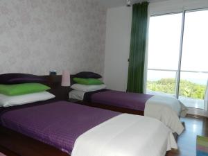 Postel nebo postele na pokoji v ubytování Hotel Garazar