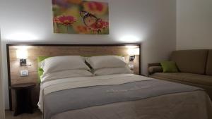 Postel nebo postele na pokoji v ubytování B&B Vanessa