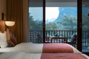 Voodi või voodid majutusasutuse The Apsara Lodge toas