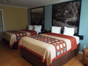 Кровать или кровати в номере INN at King City