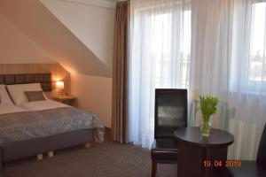 Posteľ alebo postele v izbe v ubytovaní Pensjonat SPA Dolce Vita + 37 fotografií