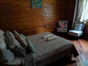 Postel nebo postele na pokoji v ubytování Le papangue