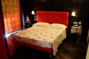 Abalon Pompei Resort客房内的一张或多张床位