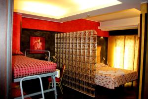 Abalon Pompei Resort客房内的一张或多张床位