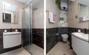 Ein Badezimmer in der Unterkunft Guest House Tomasi One