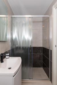 Ein Badezimmer in der Unterkunft Guest House Tomasi One