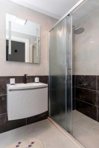 Ein Badezimmer in der Unterkunft Guest House Tomasi One