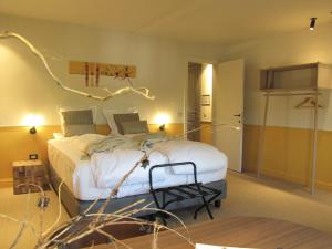 Postel nebo postele na pokoji v ubytování B&B La Corderie
