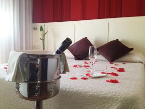 Postel nebo postele na pokoji v ubytování Hotel La Bastida