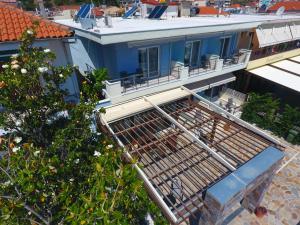 an aerial view of a house with a balcony at Sea to See in Nea Peramos