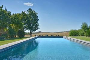 The swimming pool at or close to Chiarentana di Donata Origo