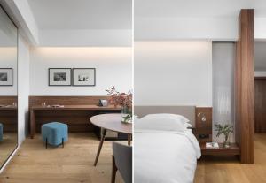 a bedroom with a bed and a desk and a table at Hotel Milan in Pula