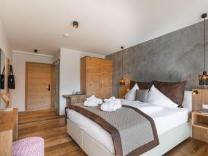 Ένα ή περισσότερα κρεβάτια σε δωμάτιο στο Hotel Auszeit