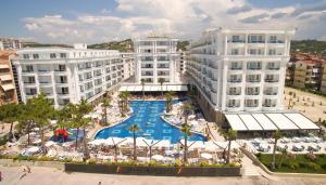 an aerial view of a resort with a swimming pool at Fantasy Beach Apartment in Golem +8 photos
