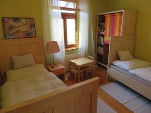 Posteľ alebo postele v izbe v ubytovaní Family Apartment Písek City Centre