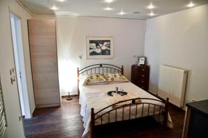Postel nebo postele na pokoji v ubytování Essential Home