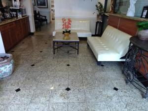 Kuchyň nebo kuchyňský kout v ubytování Athens Hotel & Suites