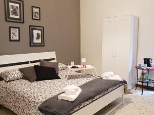 A bed or beds in a room at B&B RESTO AL SUD