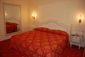 Postel nebo postele na pokoji v ubytování Hotel Motel Gold