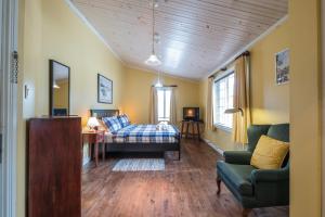 Postel nebo postele na pokoji v ubytování Auberge Sauvignon